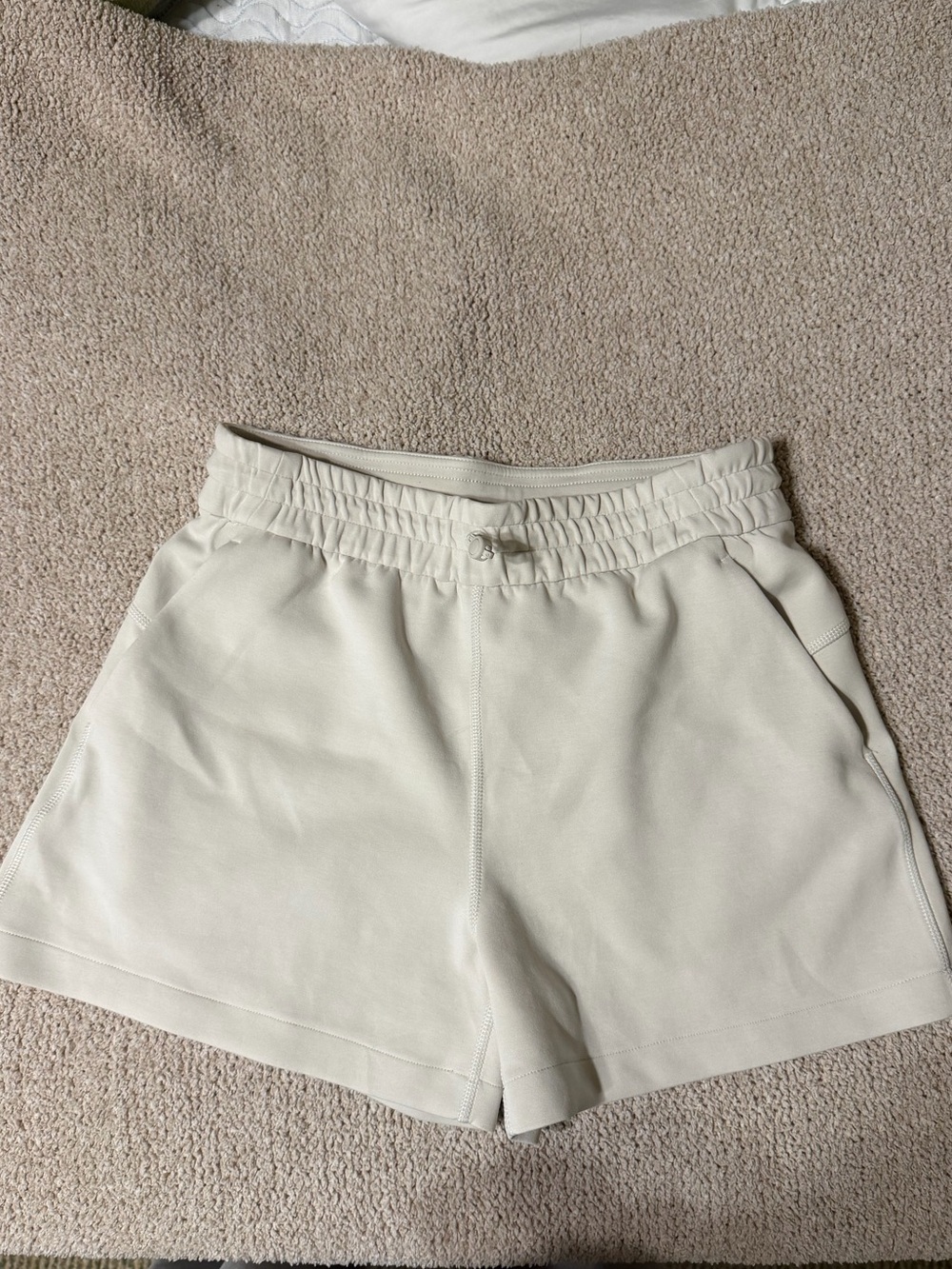 Cream Lululemon shorts